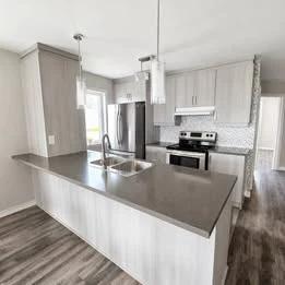 4 ½ avec pièce polyvalente à Cowansville - Disponible